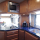 Illustration for article titled Volkner Mobil Car-Carrying Motor Home Could Be Yours For $1.2 Million